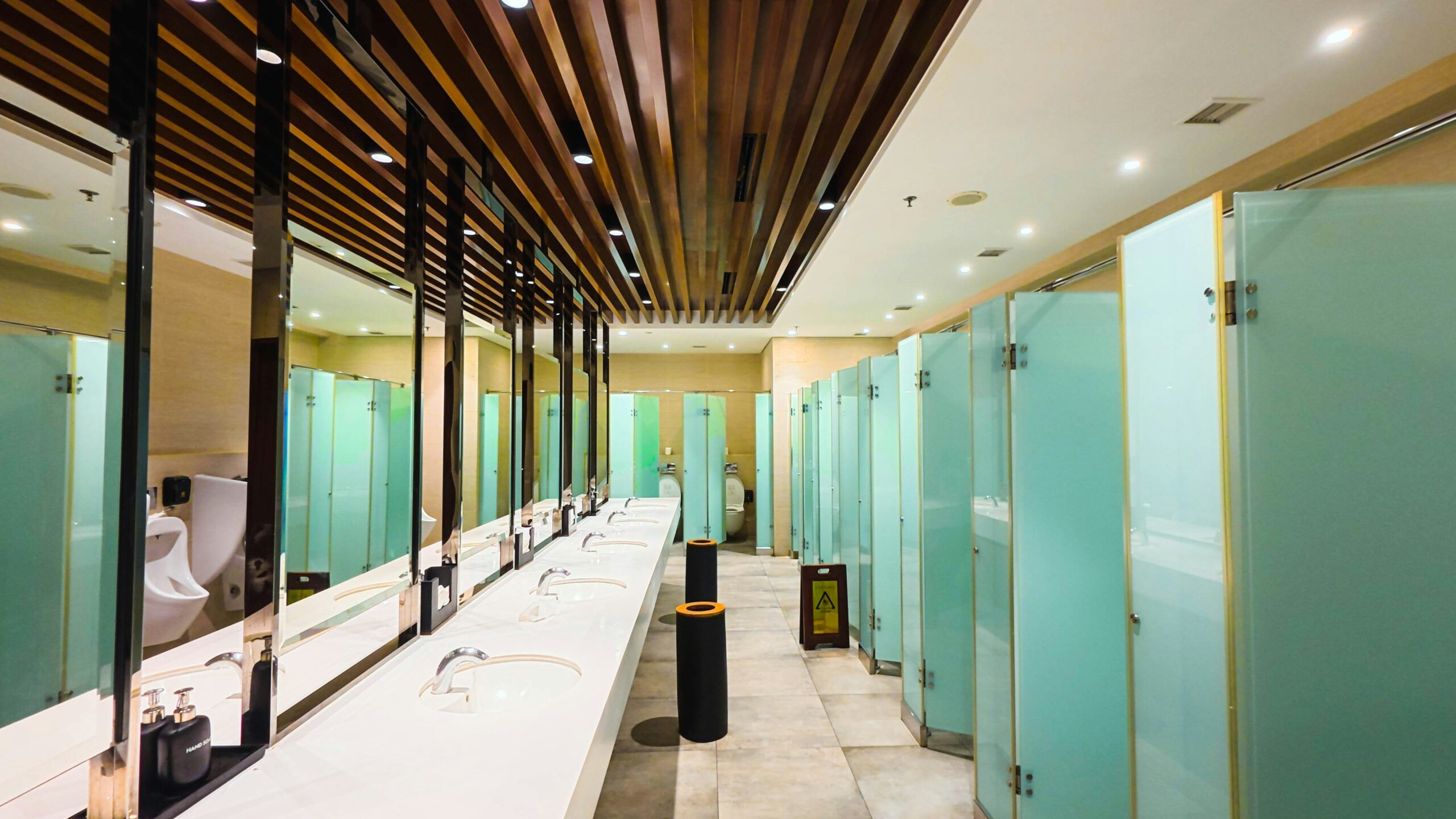 Why Retrofit Privacy Strips Often Fall Short in Commercial Restrooms